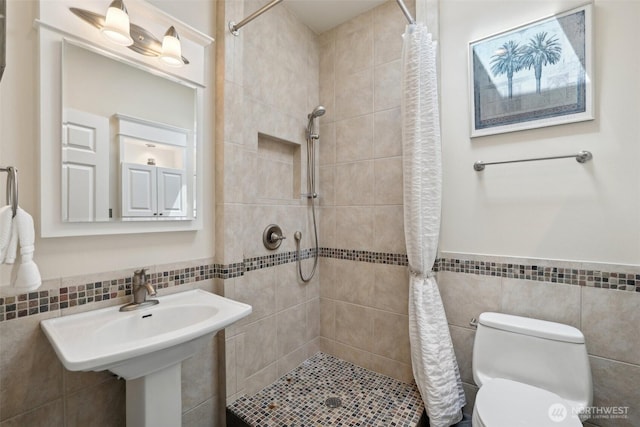 451 245th Ave SE, Sammamish, WA 98074 - full bath with tile walls, tiled shower, and a wainscoted wall