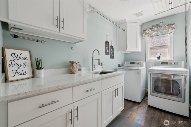451 245th Ave SE, Sammamish, WA 98074 - laundry room with separate washer and dryer, cabinet space, and dark wood-style flooring