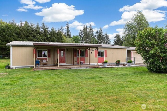 17465 NE Noll Rd NE, Poulsbo, WA 98370 - ranch-style home featuring a porch and metal roof