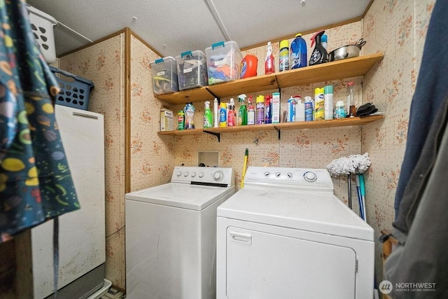 17465 NE Noll Rd NE, Poulsbo, WA 98370 - laundry room featuring wallpapered walls and washing machine and dryer