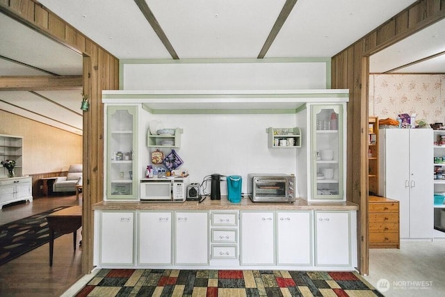 17465 NE Noll Rd NE, Poulsbo, WA 98370 - kitchen with white microwave, white cabinetry, light countertops, and open shelves