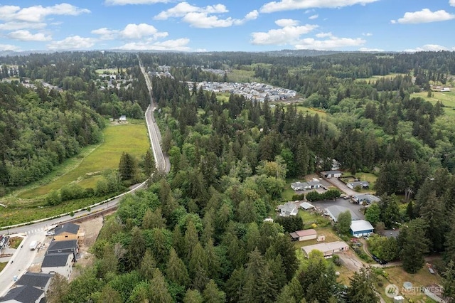 17465 NE Noll Rd NE, Poulsbo, WA 98370 - aerial overview of property's location with a forest