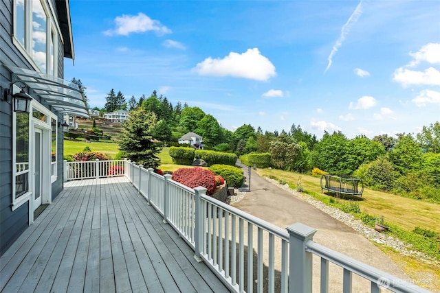 471 Dungeness Dr, Fox Island, WA 98333 - deck with a trampoline and a yard