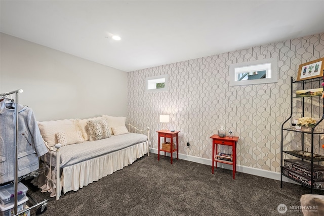 471 Dungeness Dr, Fox Island, WA 98333 - bedroom featuring wallpapered walls, dark colored carpet, and baseboards