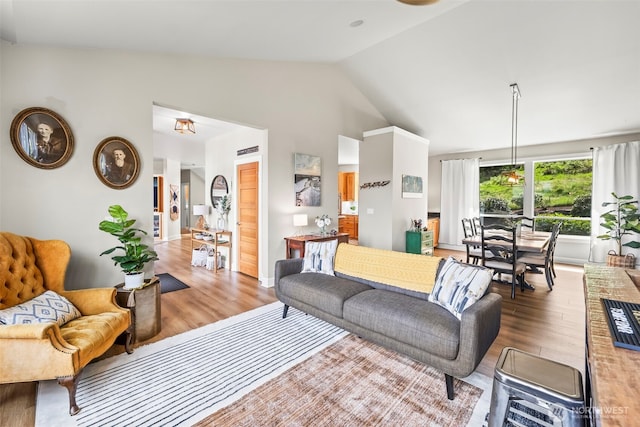 471 Dungeness Dr, Fox Island, WA 98333 - living room with wood finished floors and vaulted ceiling