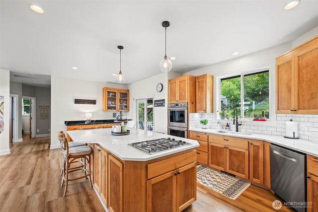 471 Dungeness Dr, Fox Island, WA 98333 - kitchen featuring appliances with stainless steel finishes, a sink, plenty of natural light, and recessed lighting