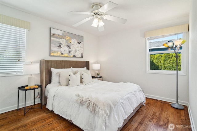 10229 35th Ave SW, Seattle, WA 98146 - bedroom with baseboards, wood finished floors, and ceiling fan