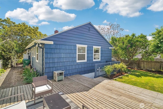 10229 35th Ave SW, Seattle, WA 98146 - back of property featuring a wooden deck, a chimney, and a cooling unit
