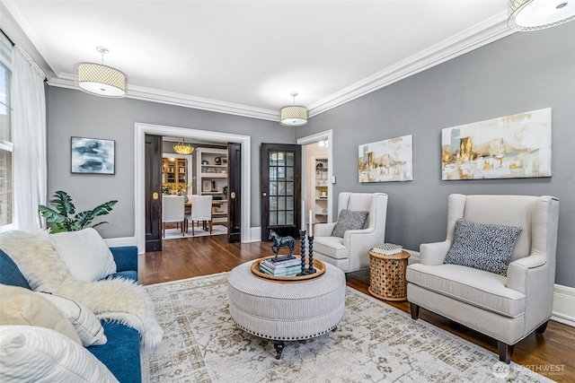 615 Boren Ave Unit 11, Seattle, WA 98104 - living area with wood finished floors, crown molding, and baseboards
