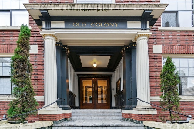 615 Boren Ave Unit 11, Seattle, WA 98104 - property entrance with brick siding and french doors
