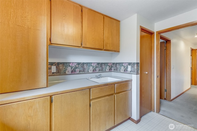 14930 15th Avenue Ct E, Tacoma, WA 98445 - kitchen with a sink and light countertops