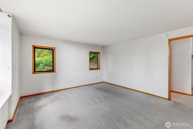 14930 15th Avenue Ct E, Tacoma, WA 98445 - spare room featuring healthy amount of natural light and light carpet