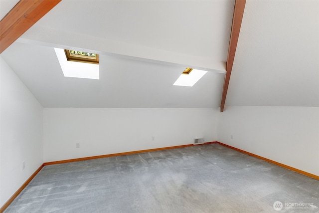 14930 15th Avenue Ct E, Tacoma, WA 98445 - bonus room featuring a skylight, carpet flooring, and baseboards