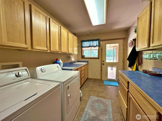 588 Mineral Creek Rd, Mineral, WA 98355 - clothes washing area with cabinet space, washer and dryer, and light tile patterned floors