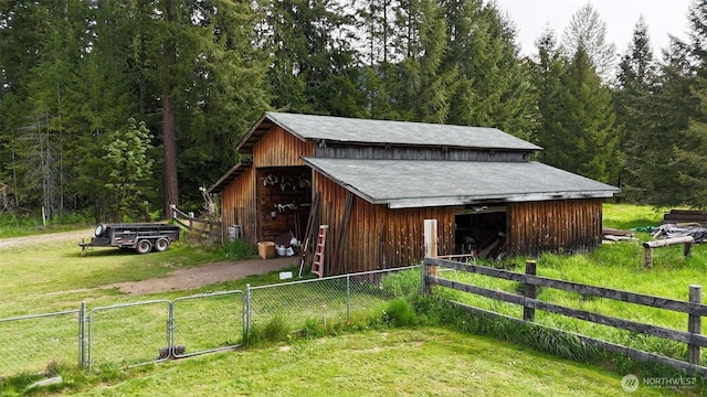 588 Mineral Creek Rd, Mineral, WA 98355 - view of pole building featuring a wooded view and dirt driveway