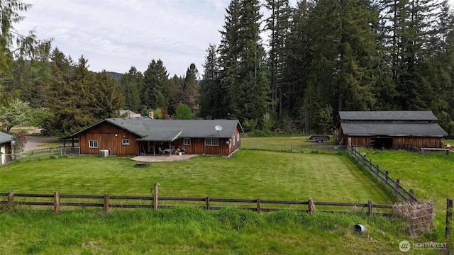 588 Mineral Creek Rd, Mineral, WA 98355 - rear view of property with a forest view, a patio, and central AC unit