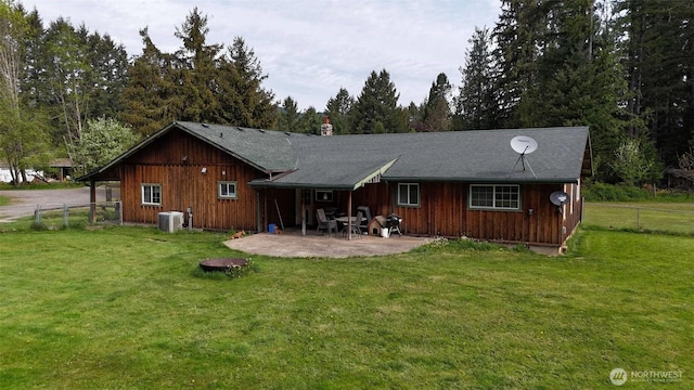 588 Mineral Creek Rd, Mineral, WA 98355 - back of house featuring cooling unit, a patio area, and a chimney
