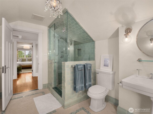 2161 E Interlaken Blvd, Seattle, WA 98112 - full bathroom with a shower stall, ensuite bathroom, toilet, and tile patterned flooring