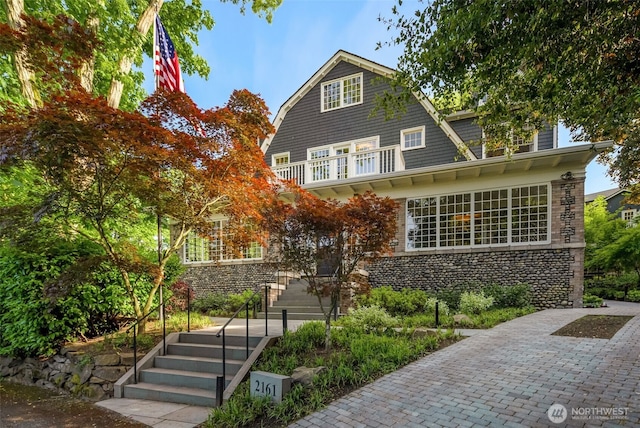 2161 E Interlaken Blvd, Seattle, WA 98112 - view of front of property with a balcony and stone siding