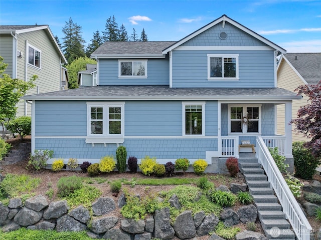 19554 Jensen Way NE, Poulsbo, WA 98370 - view of front of home featuring roof with shingles and covered porch