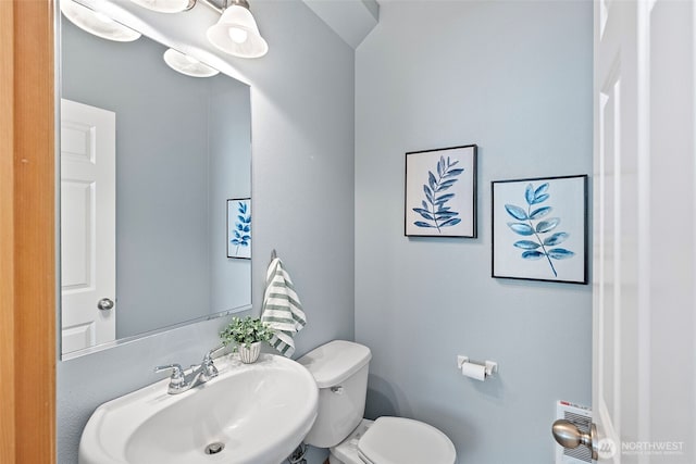 19554 Jensen Way NE, Poulsbo, WA 98370 - half bathroom with a sink, toilet, and heating unit