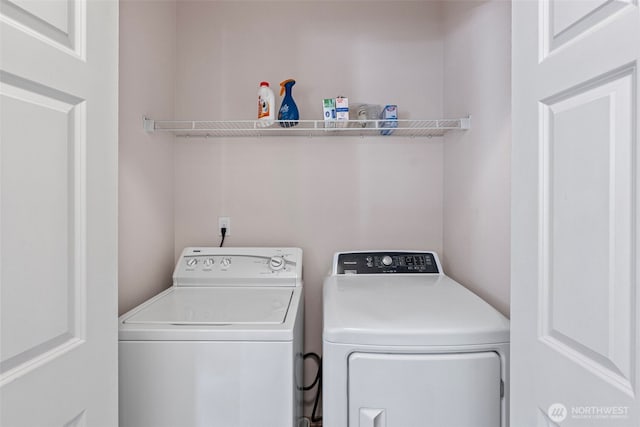 19554 Jensen Way NE, Poulsbo, WA 98370 - clothes washing area featuring washing machine and clothes dryer