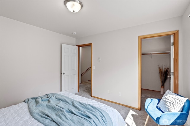 19554 Jensen Way NE, Poulsbo, WA 98370 - bedroom featuring carpet, a spacious closet, a closet, and baseboards