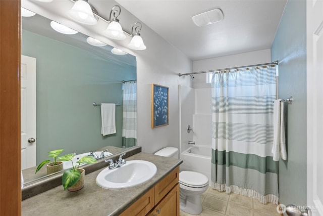19554 Jensen Way NE, Poulsbo, WA 98370 - bathroom featuring toilet, tile patterned flooring, vanity, and shower / bath combo with shower curtain