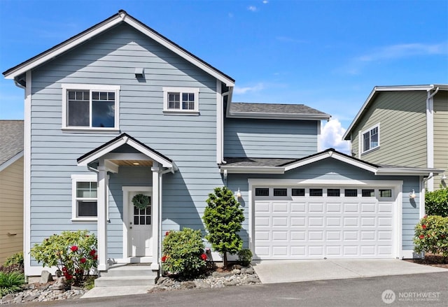 19554 Jensen Way NE, Poulsbo, WA 98370 - traditional-style house featuring concrete driveway, a shingled roof, and a garage