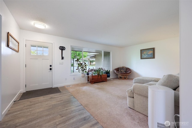 19045 Nutmeg St SW, Rochester, WA 98579 - entrance foyer featuring wood finished floors and baseboards