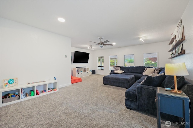 19045 Nutmeg St SW, Rochester, WA 98579 - carpeted living area featuring recessed lighting, ceiling fan, and baseboards