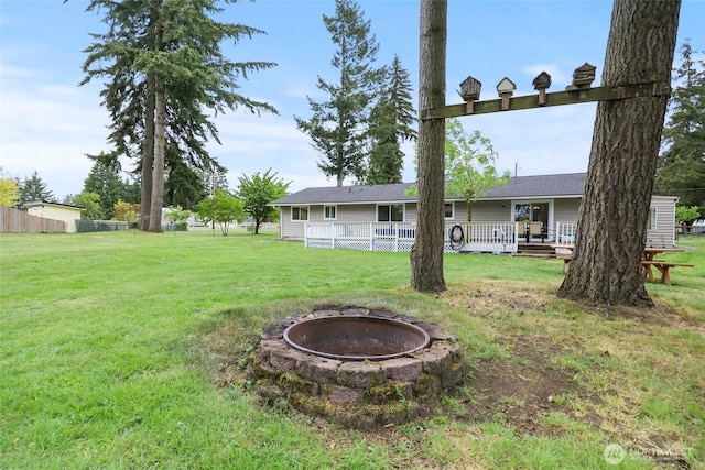 19045 Nutmeg St SW, Rochester, WA 98579 - view of yard with a fire pit and a wooden deck