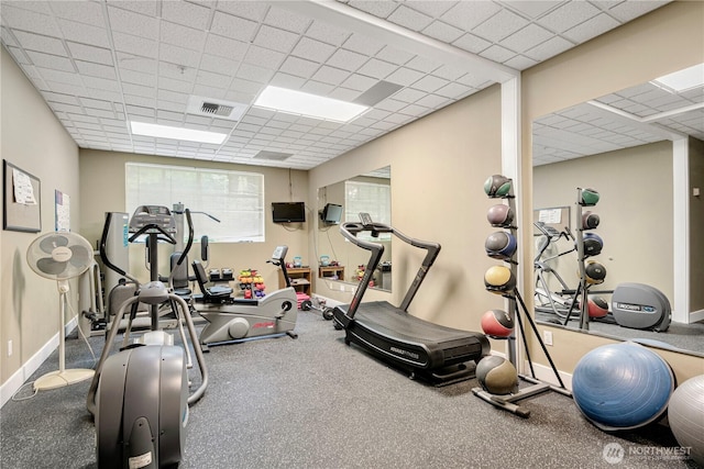 1000 Aurora Ave N Unit 311, Seattle, WA 98109 - workout room featuring a drop ceiling and baseboards