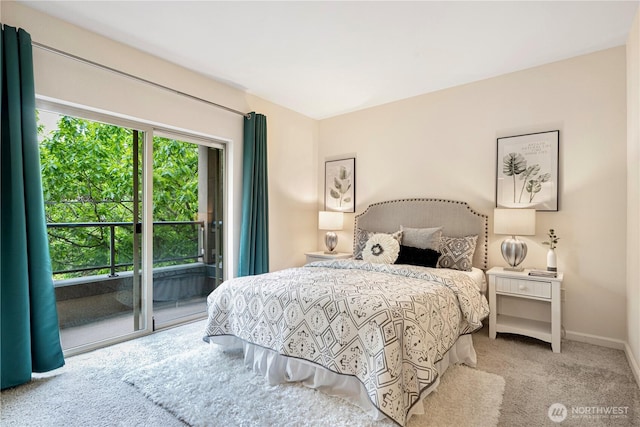 1000 Aurora Ave N Unit 311, Seattle, WA 98109 - bedroom with access to outside, carpet flooring, and baseboards