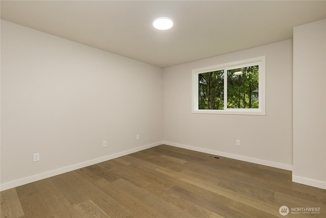 12605 Monte Cristo Way, Granite Falls, WA 98252 - empty room featuring wood finished floors and baseboards