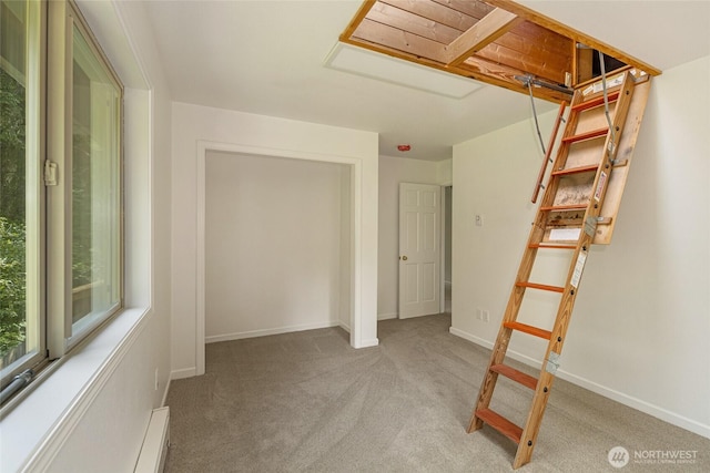 255 Alder St, Orcas Island, WA 98245 - interior space with light carpet, baseboard heating, and baseboards