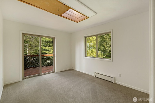 255 Alder St, Orcas Island, WA 98245 - empty room featuring baseboard heating, carpet, and baseboards