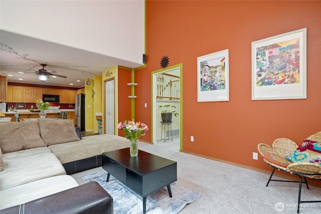 202 170th Pl SE, Bothell, WA 98012 - living room with ceiling fan, baseboards, light colored carpet, recessed lighting, and a high ceiling