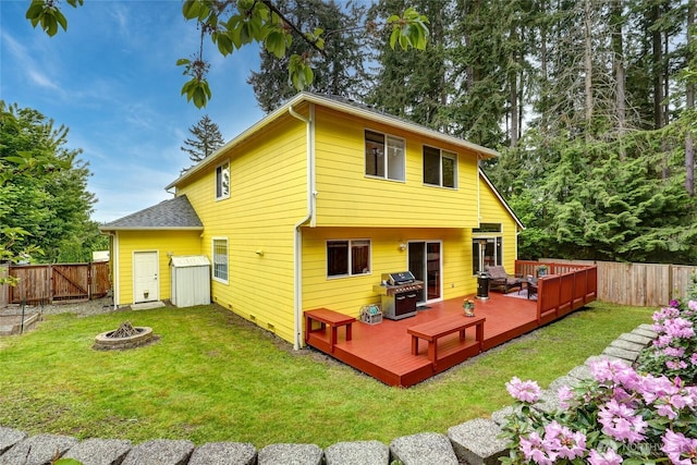 202 170th Pl SE, Bothell, WA 98012 - rear view of house with an outdoor fire pit and a wooden deck