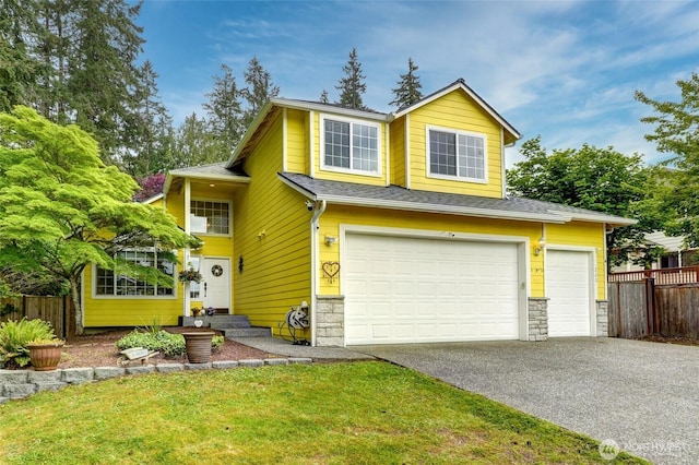 202 170th Pl SE, Bothell, WA 98012 - view of front of property with stone siding, an attached garage, and asphalt driveway