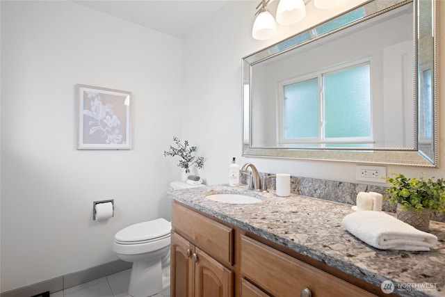 20113 4th Pl S, Des Moines, WA 98198 - bathroom featuring toilet, tile patterned floors, and vanity
