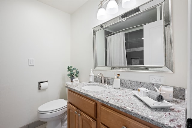 20113 4th Pl S, Des Moines, WA 98198 - bathroom featuring toilet, vanity, and curtained shower