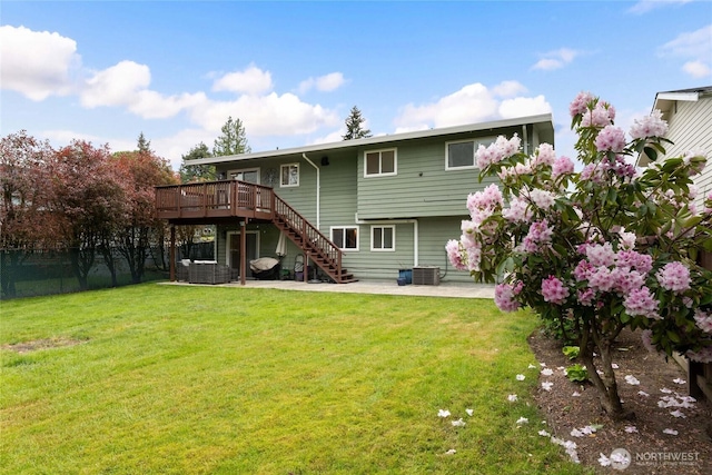 20113 4th Pl S, Des Moines, WA 98198 - back of property featuring a wooden deck, stairs, a patio area, and central AC