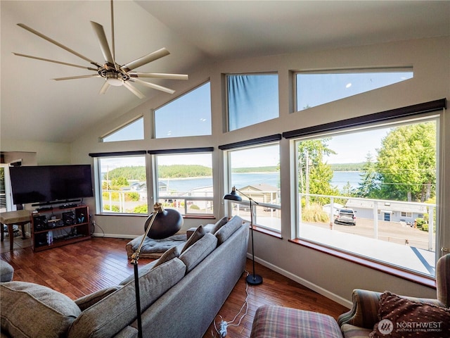 2207 Island Dr NW, Olympia, WA 98502 - living room with a water view, baseboards, ceiling fan, wood finished floors, and high vaulted ceiling