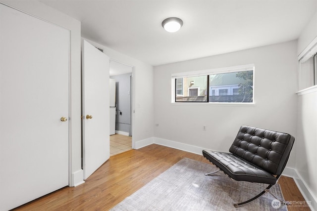 664 W Emerson St Unit A, Seattle, WA 98119 - living area with light wood finished floors and baseboards