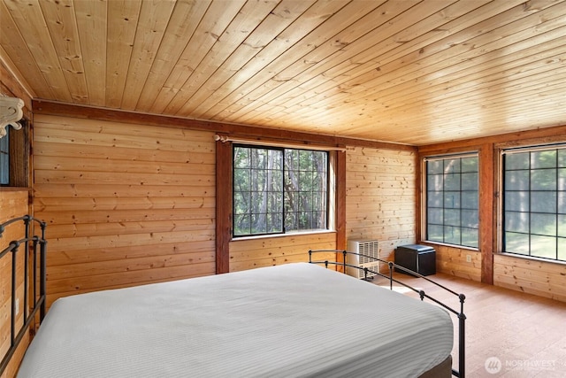 35 N Airport Way, Stuart Island, WA 98250 - bedroom with wooden walls, multiple windows, and wooden ceiling