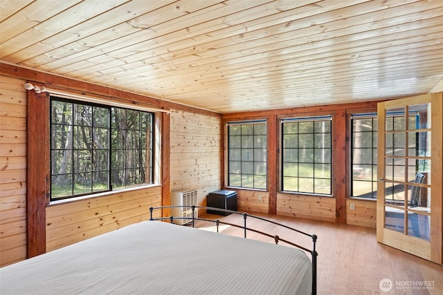 35 N Airport Way, Stuart Island, WA 98250 - bedroom with wooden ceiling, wooden walls, and hardwood / wood-style floors