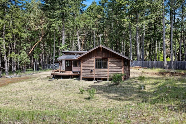 35 N Airport Way, Stuart Island, WA 98250 - back of house featuring a deck and a forest view
