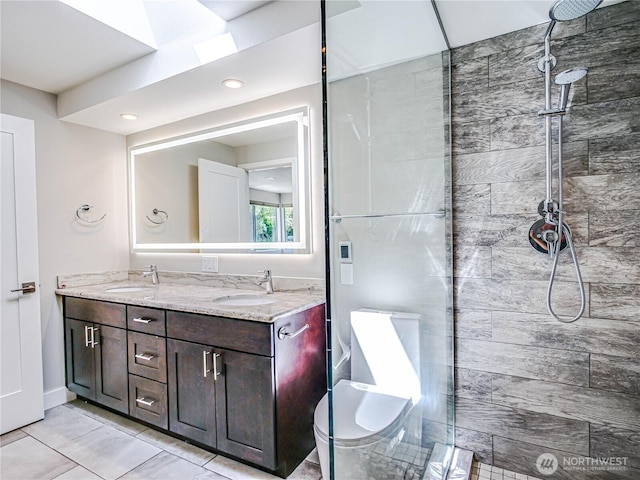 4441 53rd Ave SW, Seattle, WA 98116 - full bathroom with double vanity, a tile shower, tile patterned flooring, and recessed lighting
