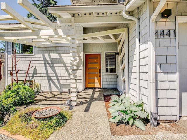 4441 53rd Ave SW, Seattle, WA 98116 - doorway to property featuring a pergola